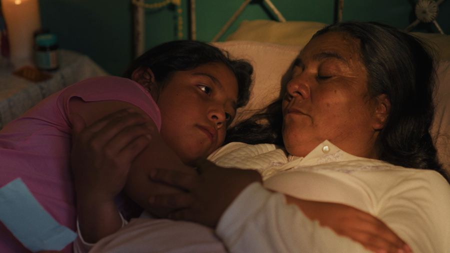Ramona lying beside her mother in bed