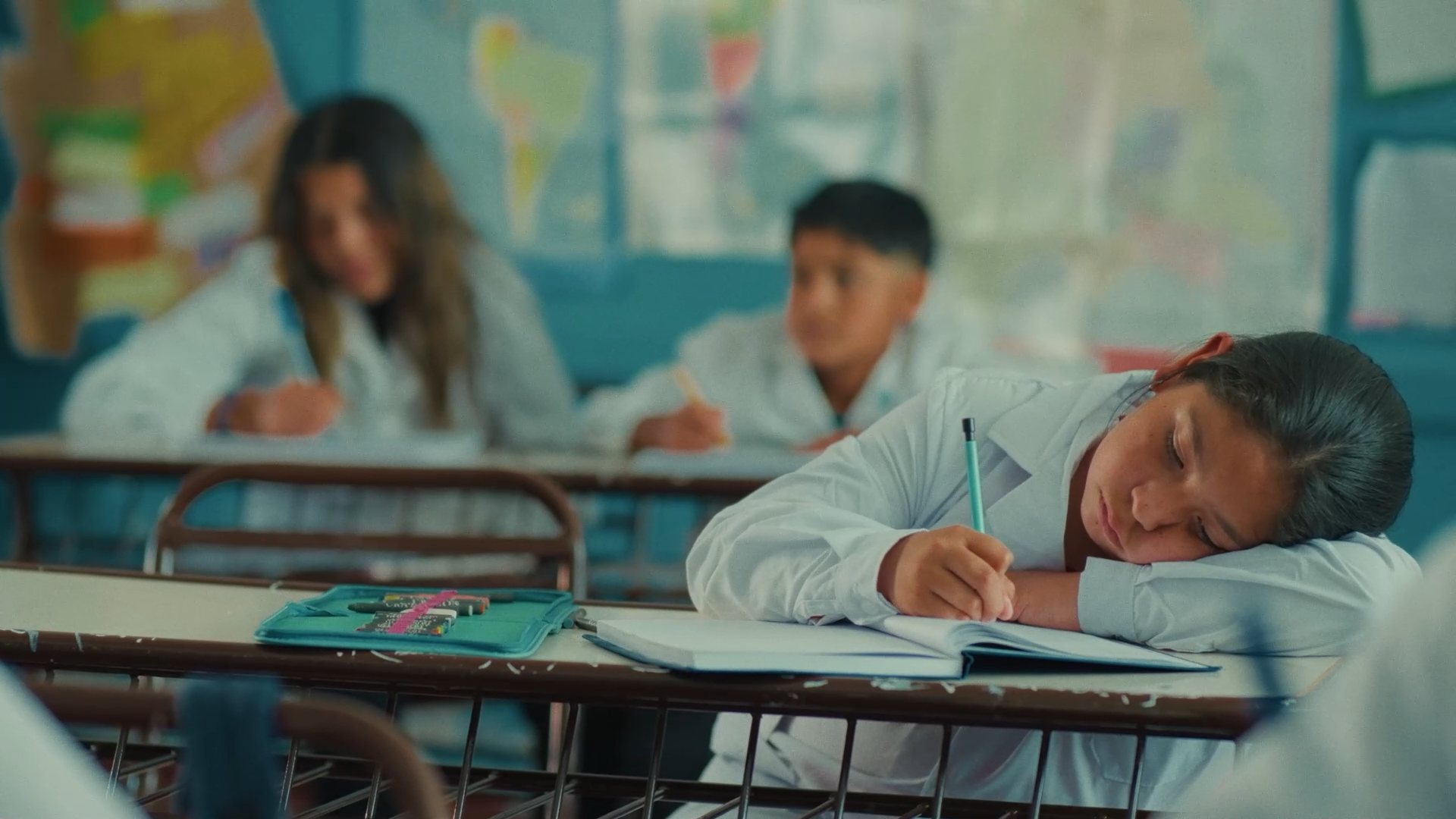 Ramona resting her head on her school desk